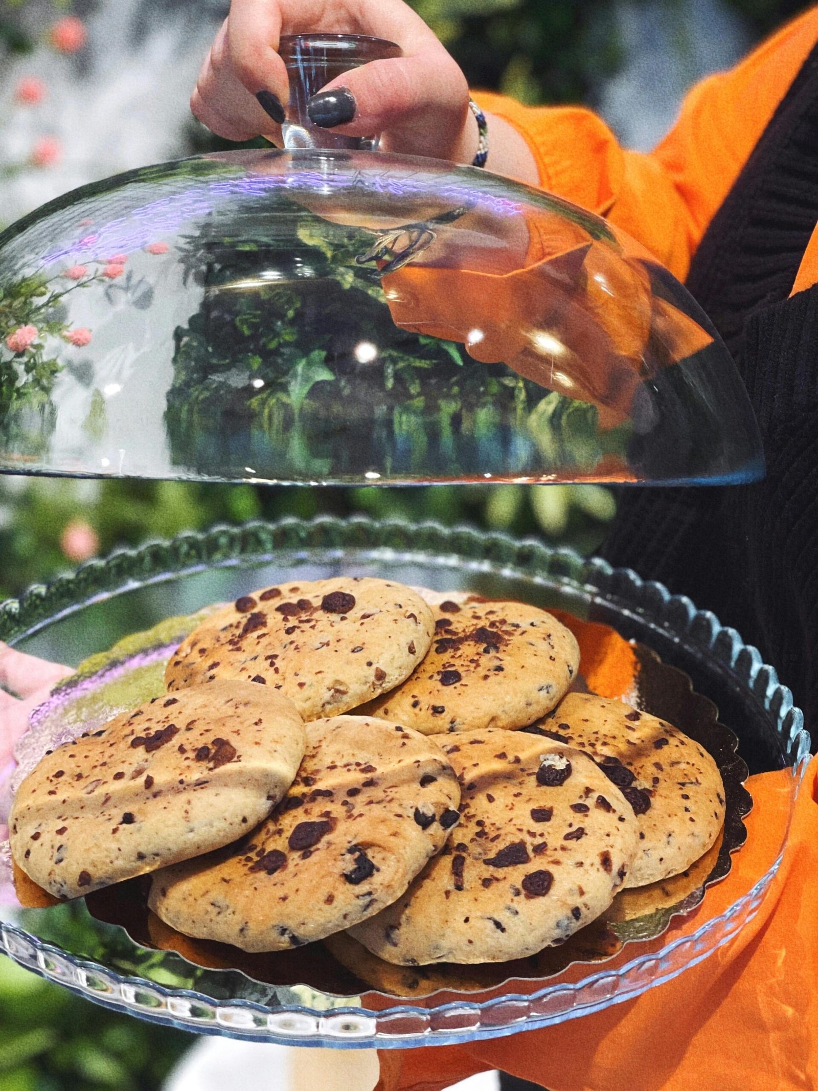 A pile of chocolate cookies falling into the air