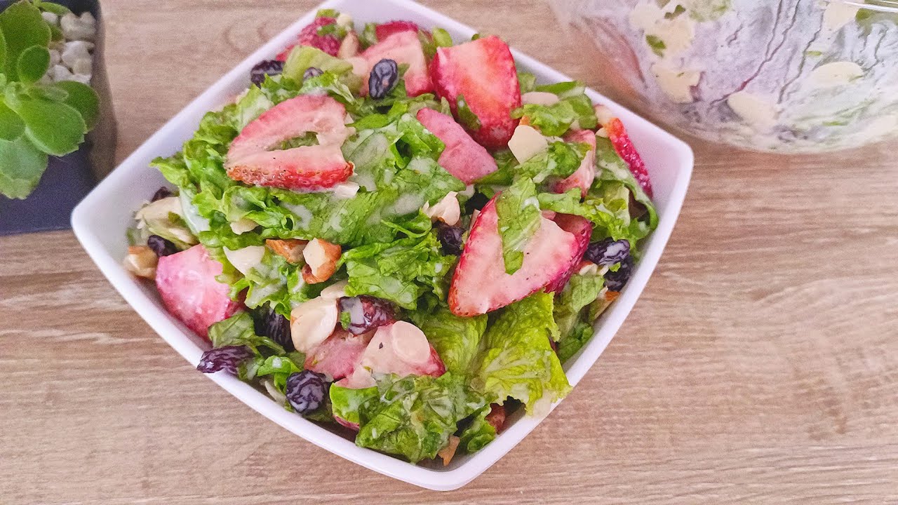 Ensalada de rúcula con durazno y almendras