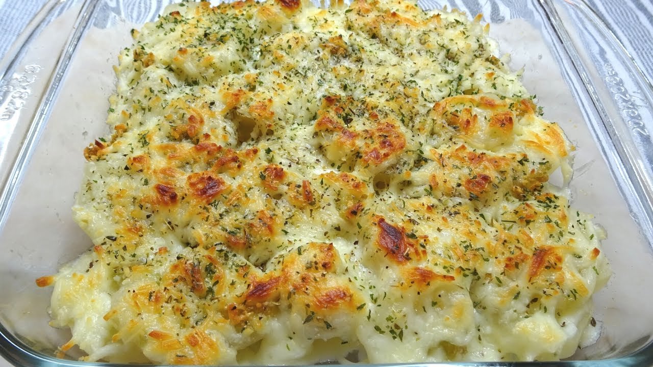 Receta de Patatas al horno con queso y mantequilla