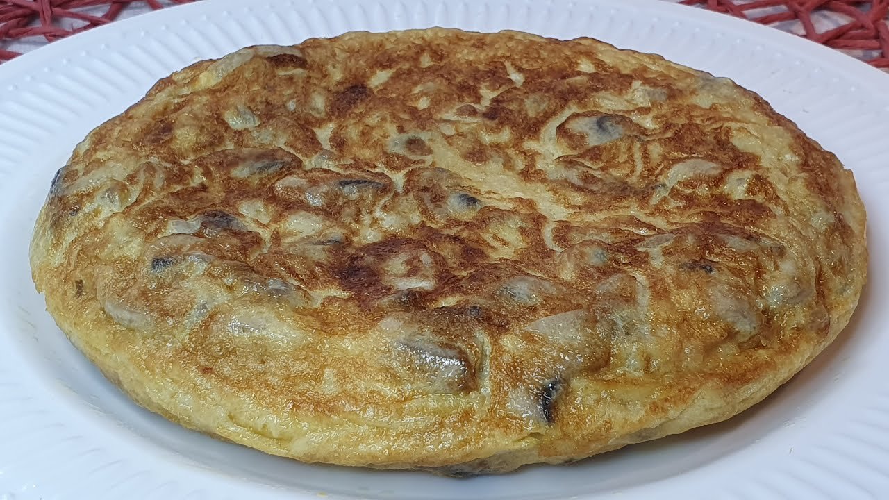 Receta de Tortilla de patatas con champiñones