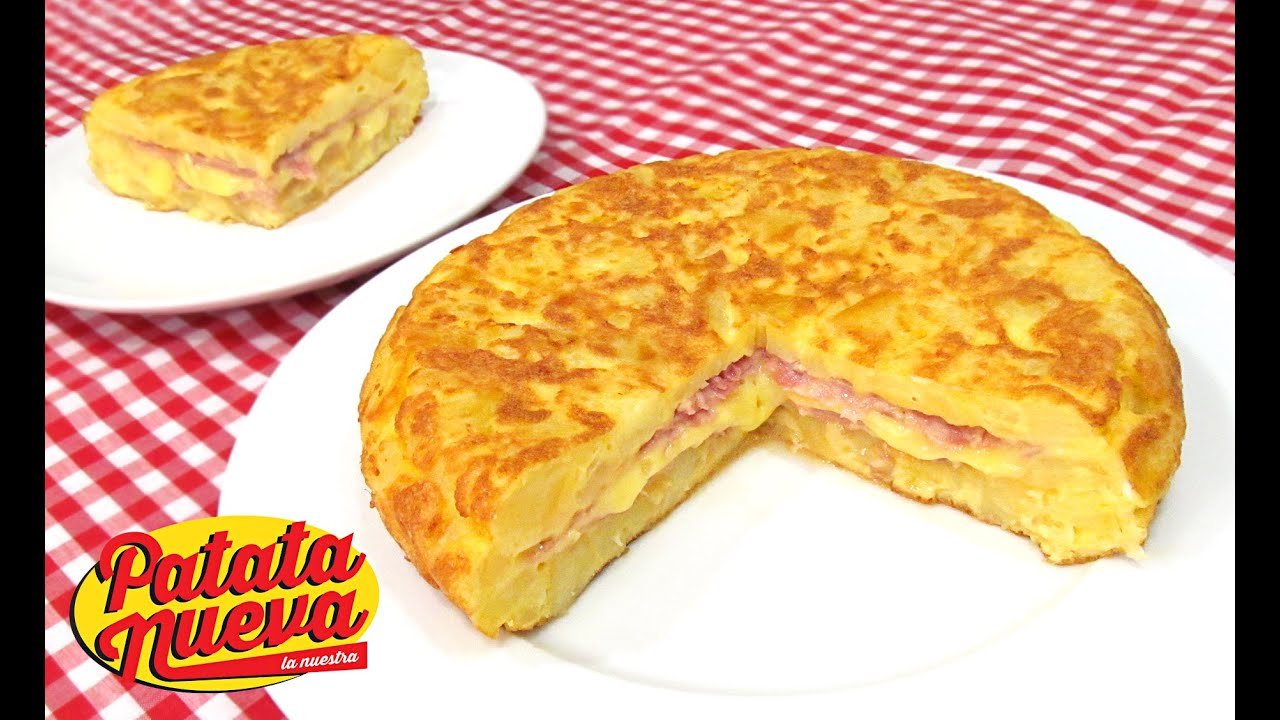 Receta de Tortilla de patatas rellena de jamón y queso