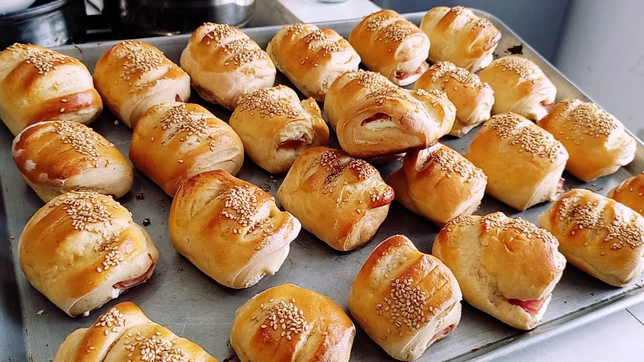 Receta de Arrollado de jamón y queso con masa casera