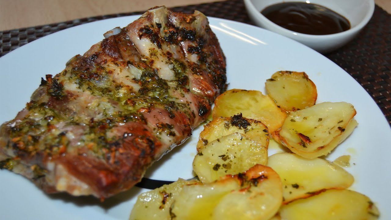 Receta de Costillas adobadas con patatas al horno