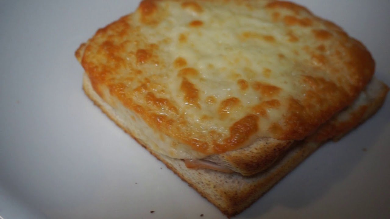 Receta de Tostas de jamón y queso al horno